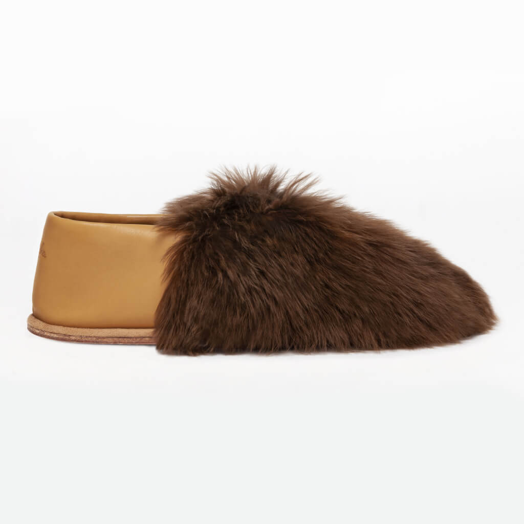 Chocolate Express. Ethical Alpaca fur luxury slippers. Leather soles. Sheepskin interior. Made in Peru. Animal cruelty free.