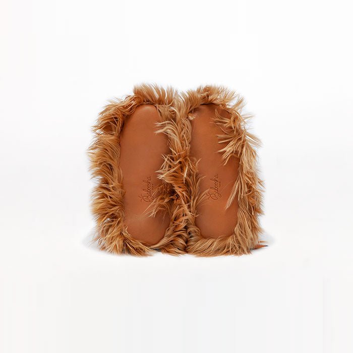 Kids Swirl alpaca fur slippers color honey. Leather outsole. Ethical alpaca fur slippers for toddlers. Made in Peru Suri fur.