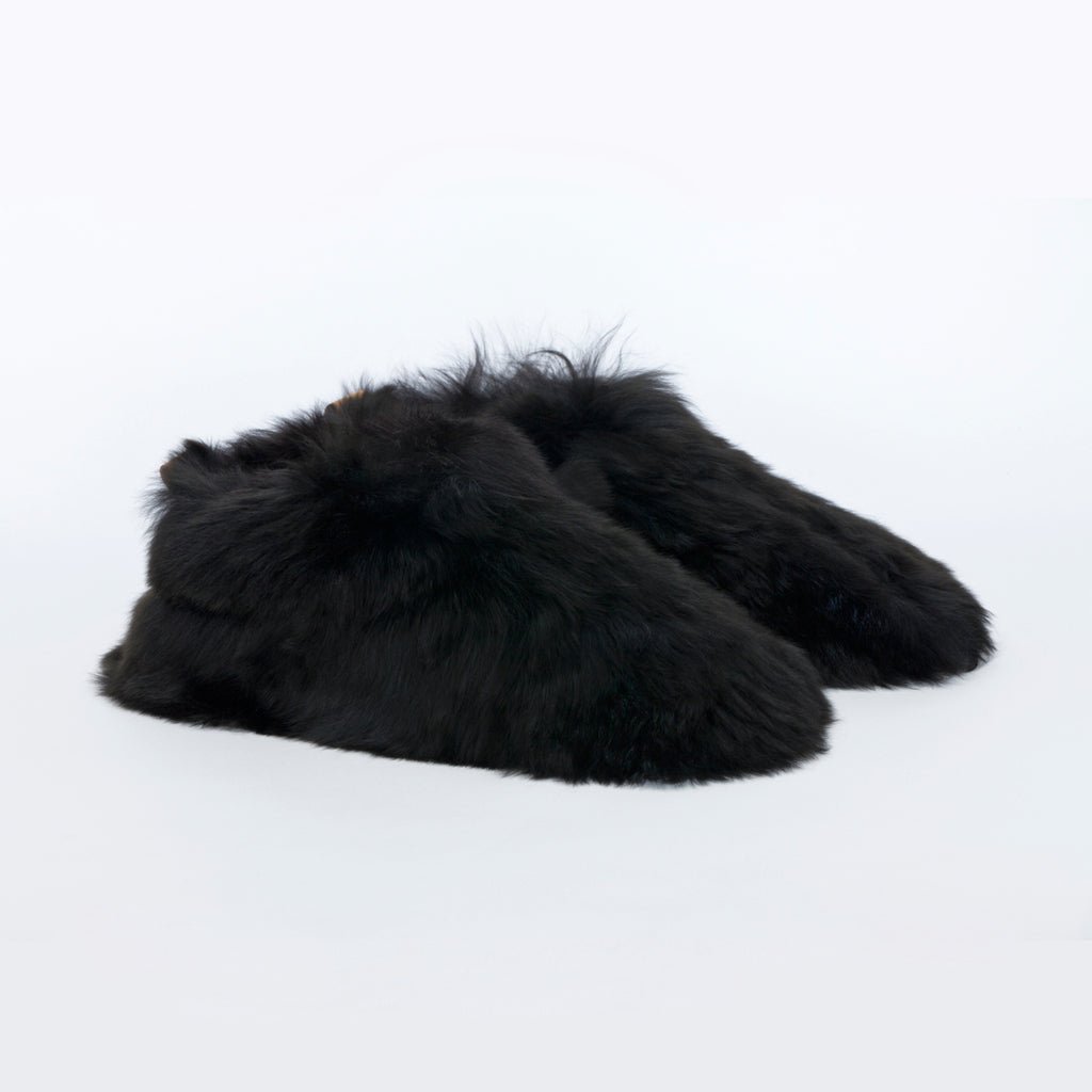 Black Swirl. Ethical fur. Alpaca fur luxury slippers. Leather soles. Sheepskin interior. Made in Peru. Animal cruelty free.