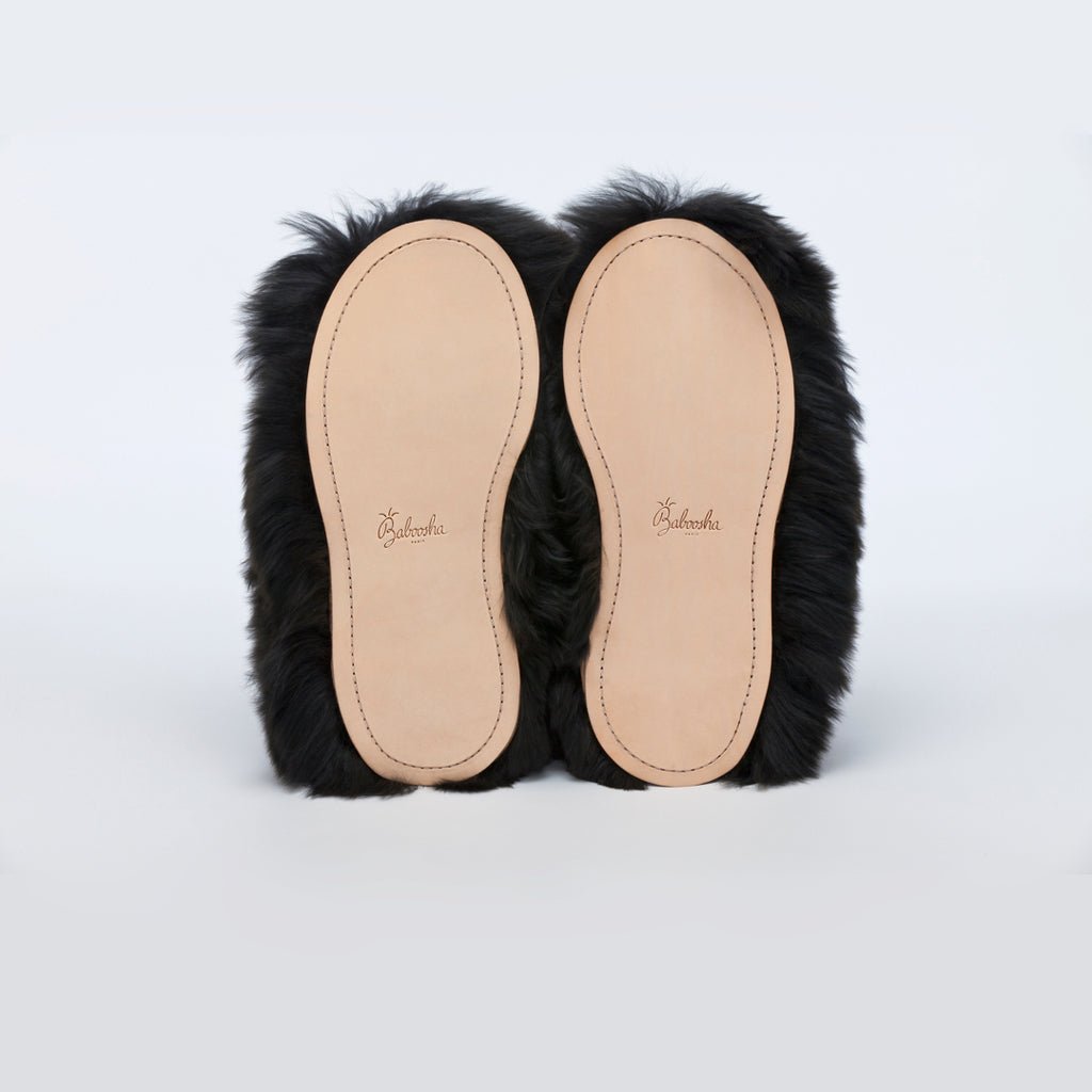 Black Swirl. Ethical fur. Alpaca fur luxury slippers. Leather soles. Sheepskin interior. Made in Peru. Animal cruelty free.