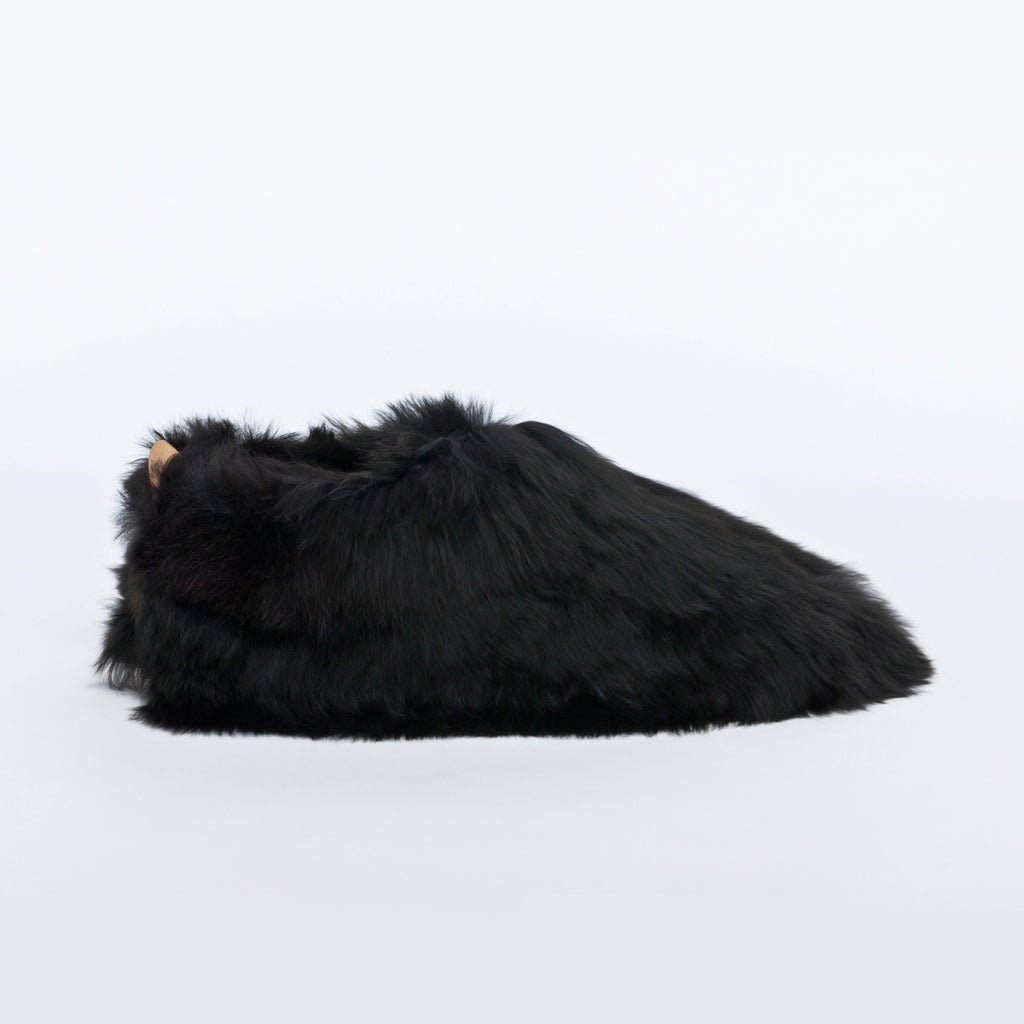 Black Swirl. Ethical fur. Alpaca fur luxury slippers. Leather soles. Sheepskin interior. Made in Peru. Animal cruelty free.