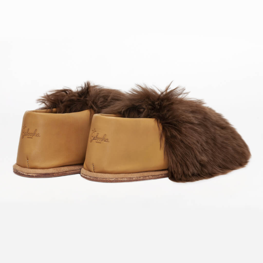 Chocolate Express. Ethical Alpaca fur luxury slippers. Leather soles. Sheepskin interior. Made in Peru. Animal cruelty free.