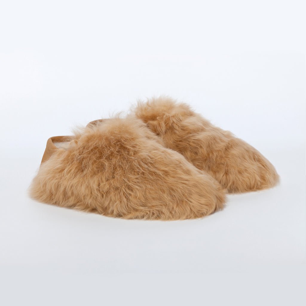 Honey Express. Ethical Alpaca fur luxury slippers. Leather soles. Sheepskin interior. Made in Peru. Animal cruelty free.