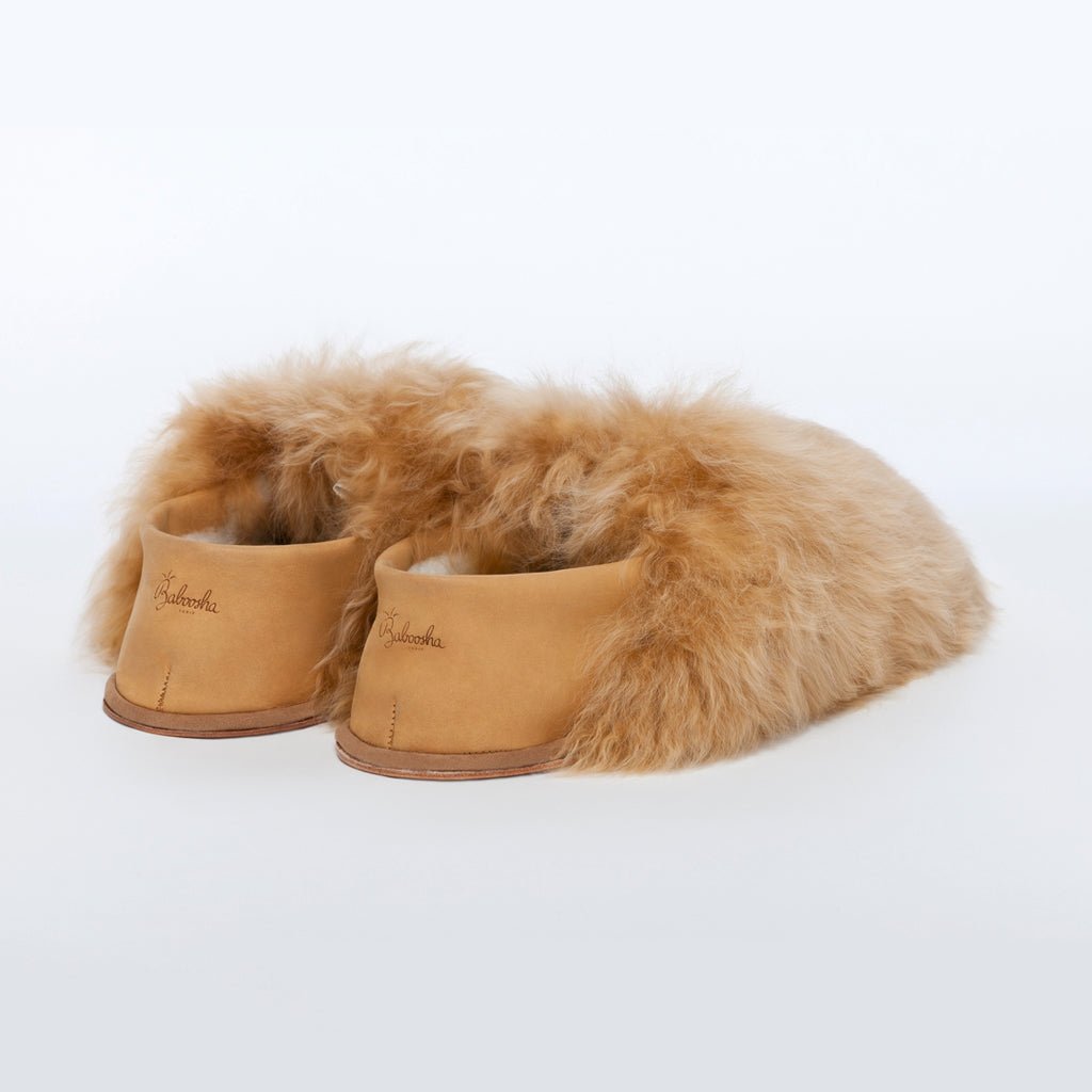 Honey Express. Ethical Alpaca fur luxury slippers. Leather soles. Sheepskin interior. Made in Peru. Animal cruelty free.