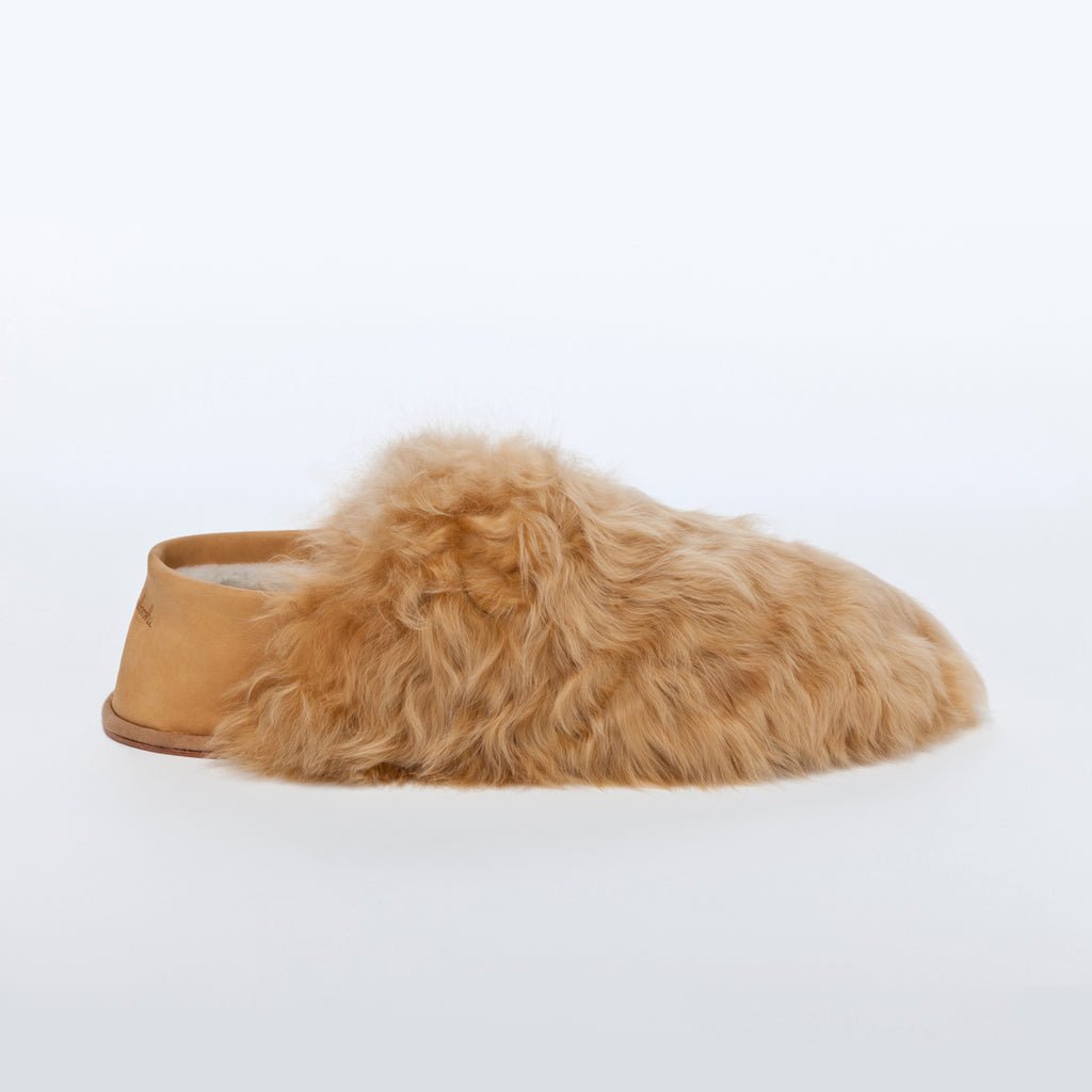 Honey Express. Ethical Alpaca fur luxury slippers. Leather soles. Sheepskin interior. Made in Peru. Animal cruelty free.