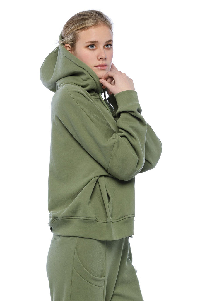 Oversized drawstring hoodie green agave with zipped closure and front pocket. Peruvian pima cotton. French terry loungewear.