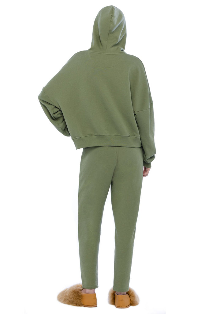 Oversized drawstring hoodie green agave with zipped closure and front pocket. Peruvian pima cotton. French terry loungewear.