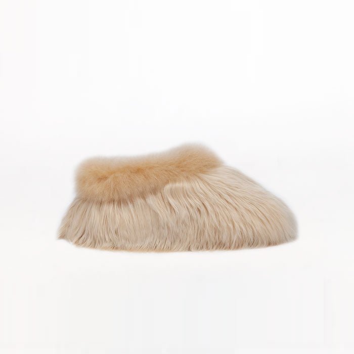 Kids Swirl alpaca fur slippers color Almond Satin light beige. Leather outsole. Ethical alpaca fur slippers for toddlers.