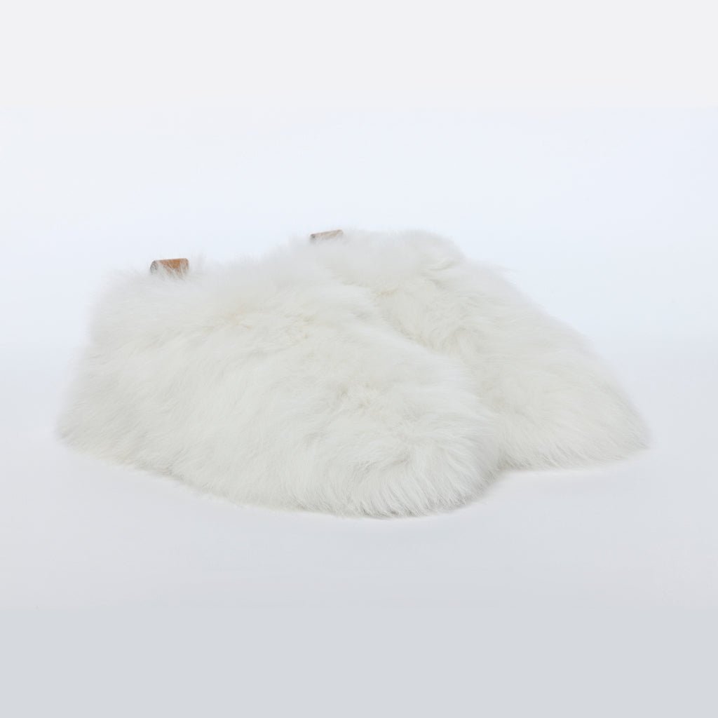 Pearl White Swirl. Ethical Alpaca fur luxury slippers. Leather soles. Sheepskin interior. Made in Peru. Animal cruelty free.