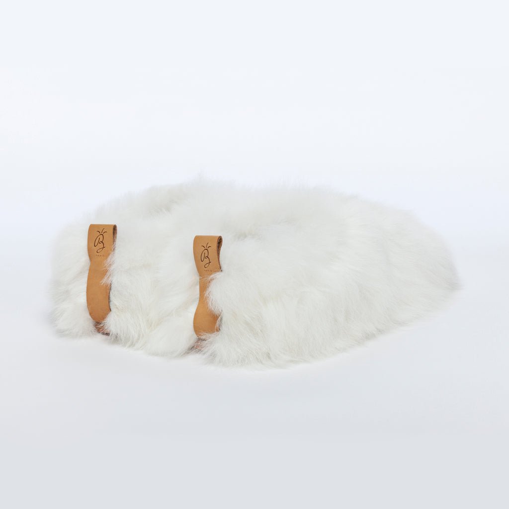 Pearl White Swirl. Ethical Alpaca fur luxury slippers. Leather soles. Sheepskin interior. Made in Peru. Animal cruelty free.