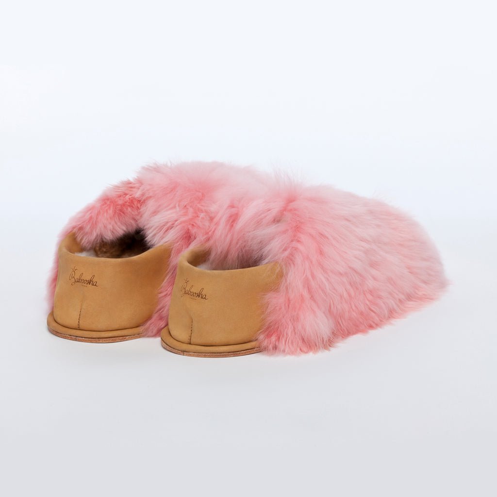 Pink Express. Ethical Alpaca fur luxury slippers. Leather soles. Sheepskin interior. Made in Peru. Animal cruelty free.