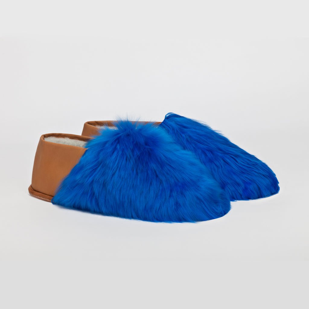 Royal Blue Express. Ethical Alpaca fur luxury slippers. Leather soles. Sheepskin interior. Made in Peru. Animal cruelty free.