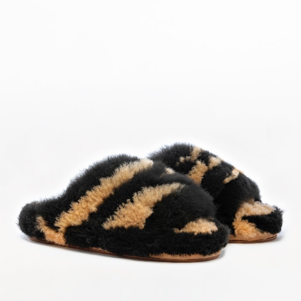 Black brown tiger stripes. Alpaca fur luxury platform slippers. Leather soles. Made in Peru. Animal cruelty free. Ethical fur