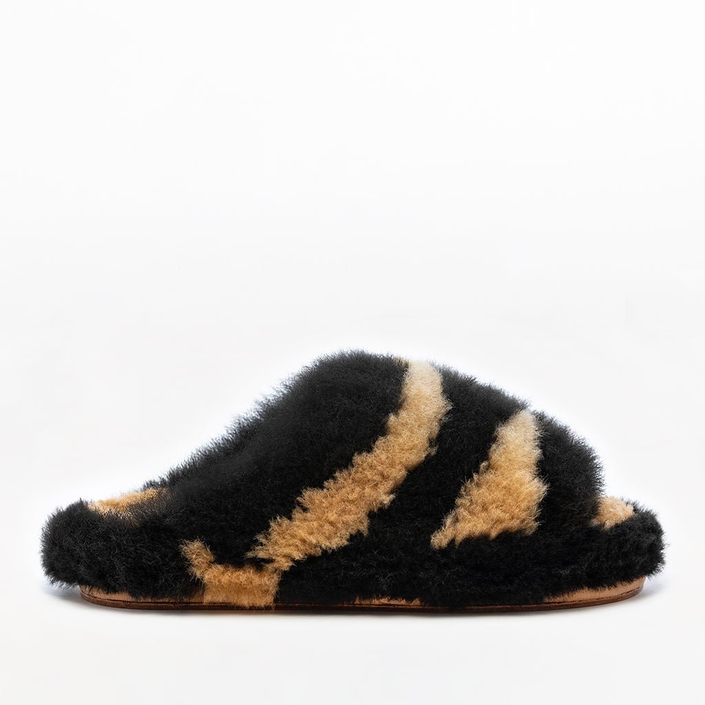 Black brown tiger stripes. Alpaca fur luxury platform slippers. Leather soles. Made in Peru. Animal cruelty free. Ethical fur